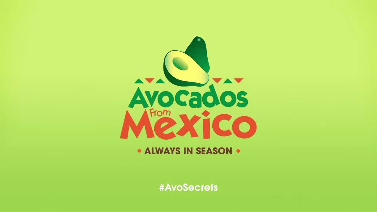 The Avocados From Mexico logo, featuring a green avocado and red text, is displayed against a bright green background with a hashtag below.