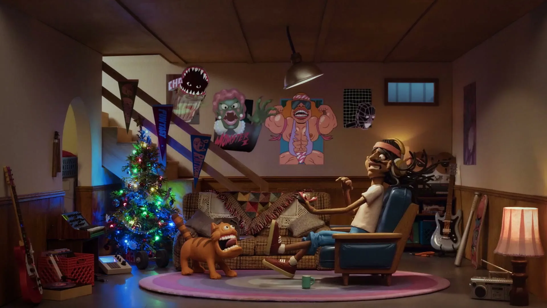A stop-motion animated man with dreadlocks and a headband sits in an armchair, looking excited, while a tiger-like creature stands nearby in a cozy, decorated room.