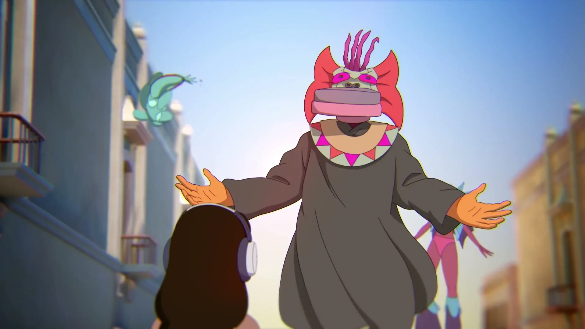 A young woman with headphones on her head looks at a large, colorful monster with a cake on its head, standing in a street.
