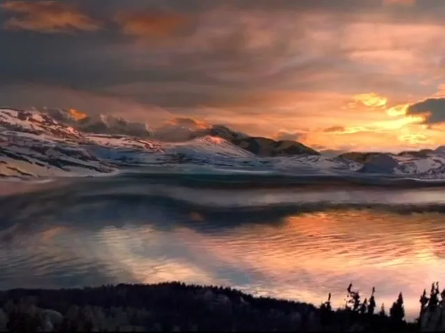 A wide shot of a serene lake reflecting the vibrant colors of a sunset sky, surrounded by snow-capped mountains and dark forests.