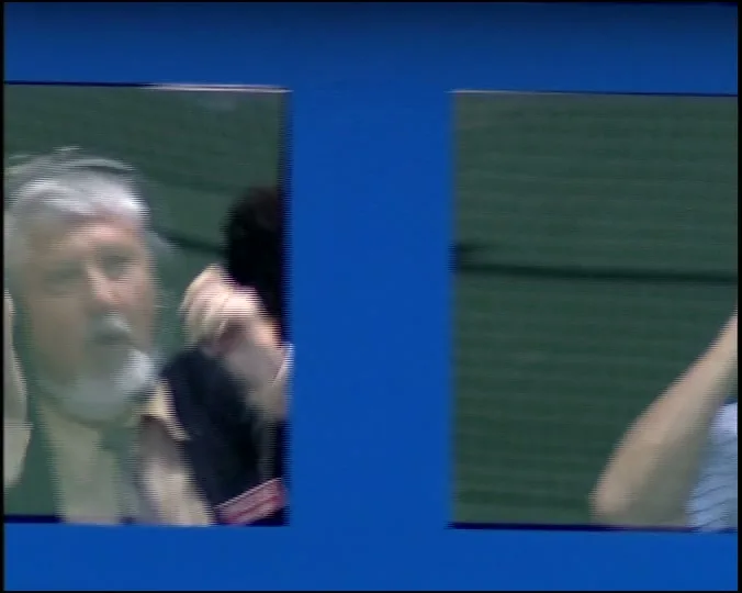 A split screen shows two male commentators, one with a beard and one with sunglasses, wearing headsets and reacting to a tennis match.