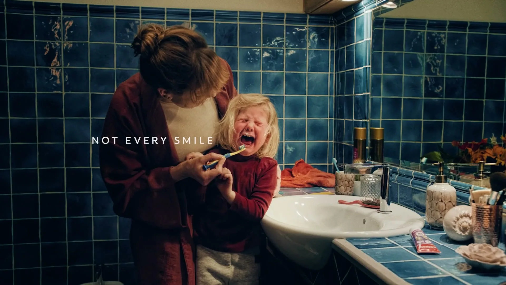 Colgate "Not every smile starts as a smile" (2026) commercial still