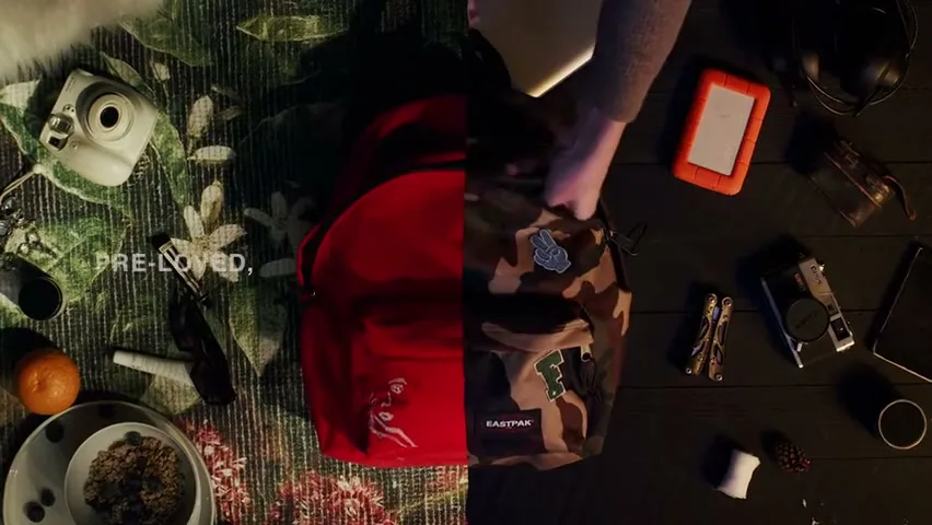 A split screen shows two people packing two different Eastpak backpacks with various items on a patterned rug and a dark wooden table.