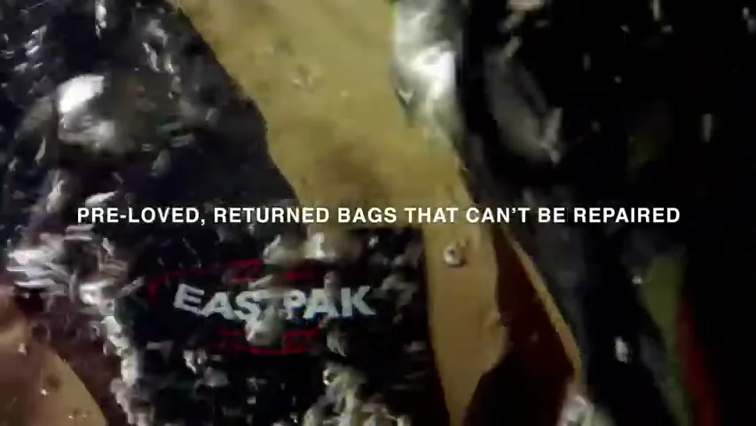 A close-up shot shows a black Eastpak bag with its logo visible, submerged in water with bubbles, as white text appears on screen.