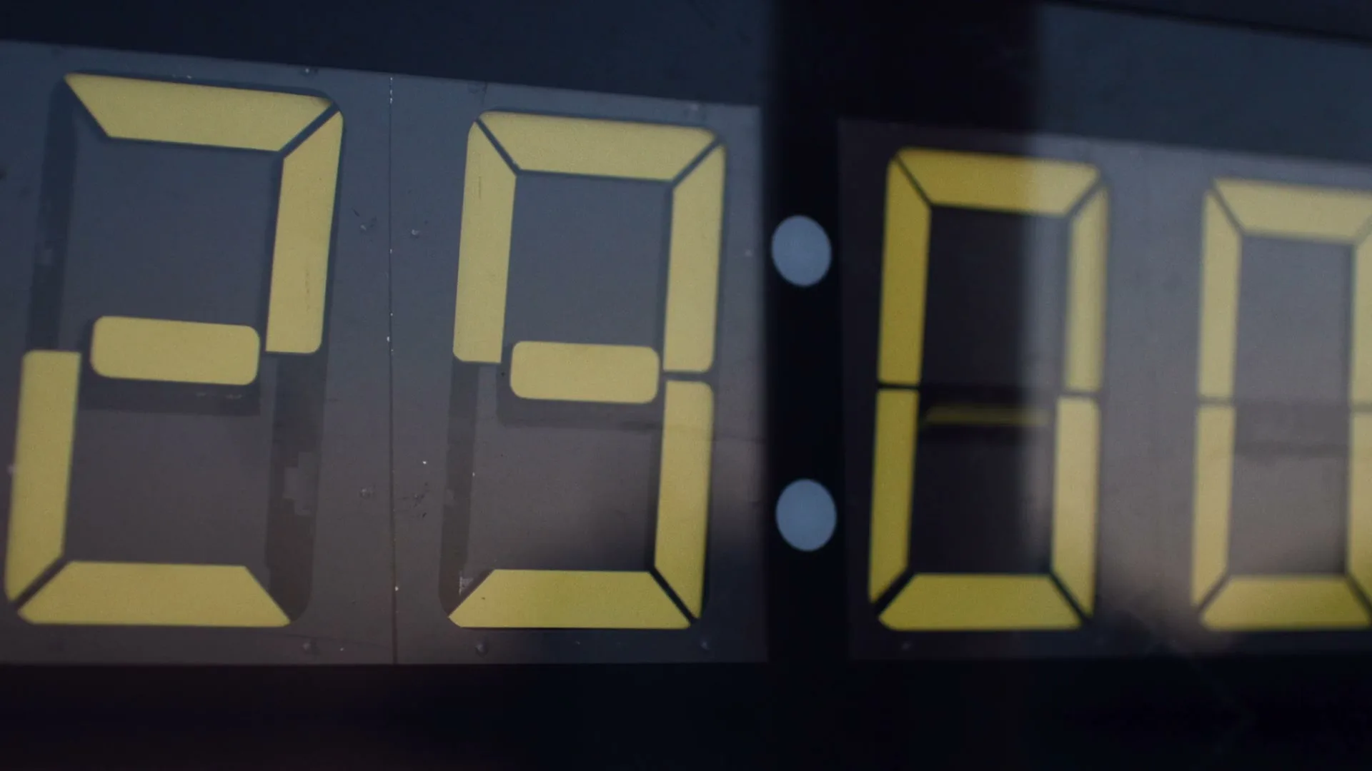 A close-up shot of a digital timer counting down from 30 seconds, with yellow numbers on a dark background.