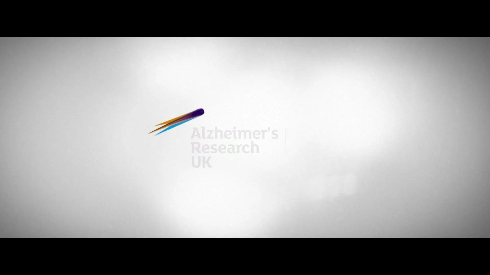 The Alzheimer's Research UK logo and tagline appear on a white background, with a faint texture resembling clouds or smoke.
