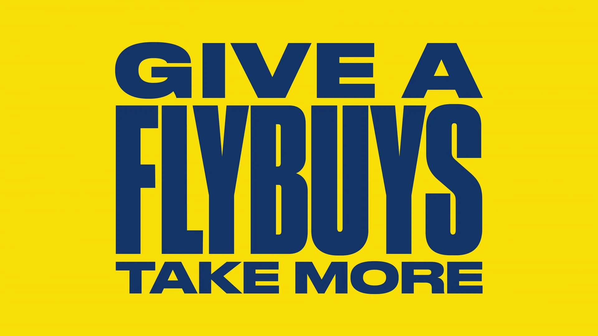 Blue text on a yellow background reads "GIVE A FLYBUYS TAKE MORE" in a bold, sans-serif font.