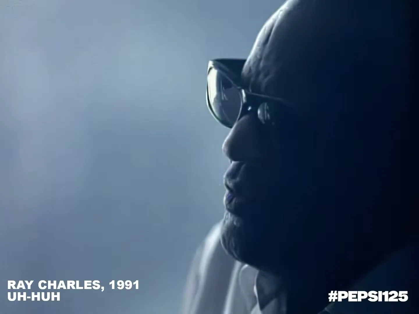 Ray Charles, silhouetted, plays piano in a smoky room, while a woman's silhouette dances in the foreground, creating a mysterious and artistic scene.