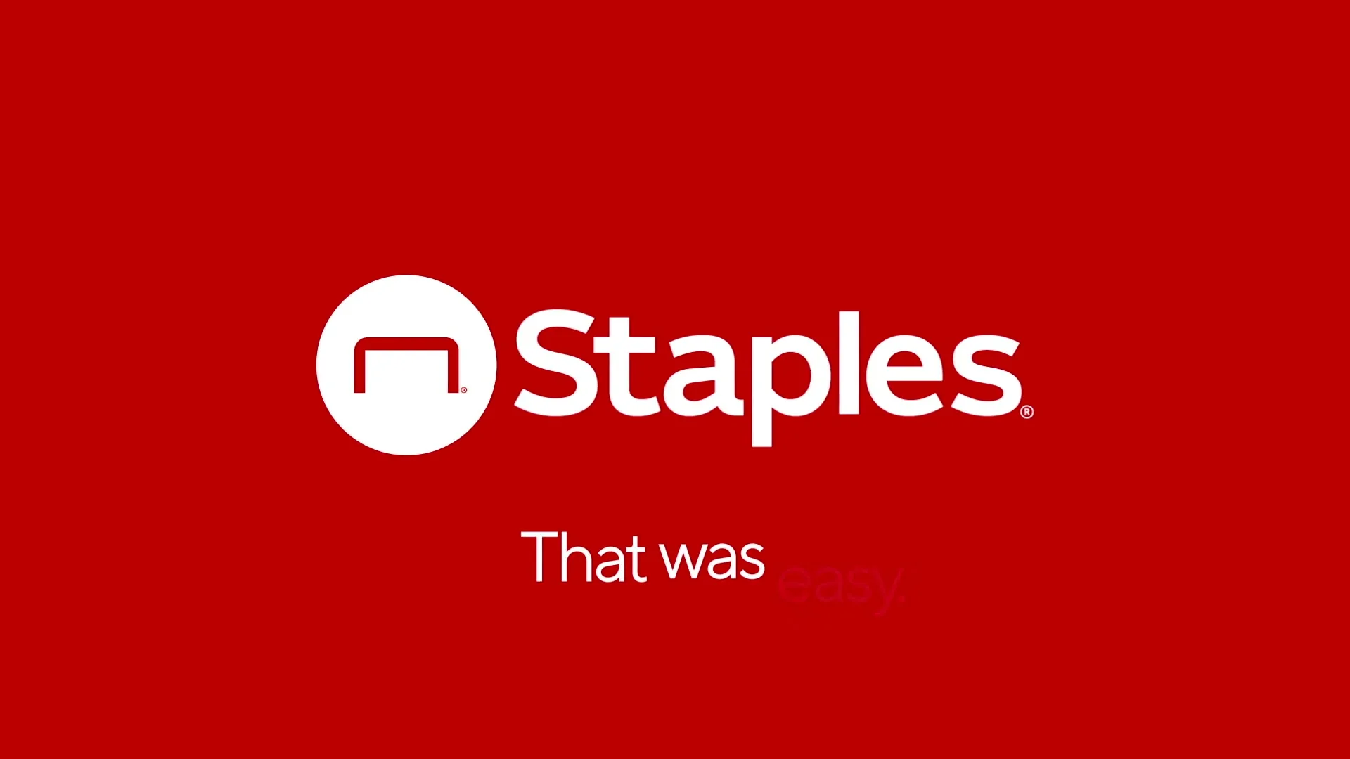 The Staples logo and tagline "That was easy." appear on a red background, with the logo animating in from a button.