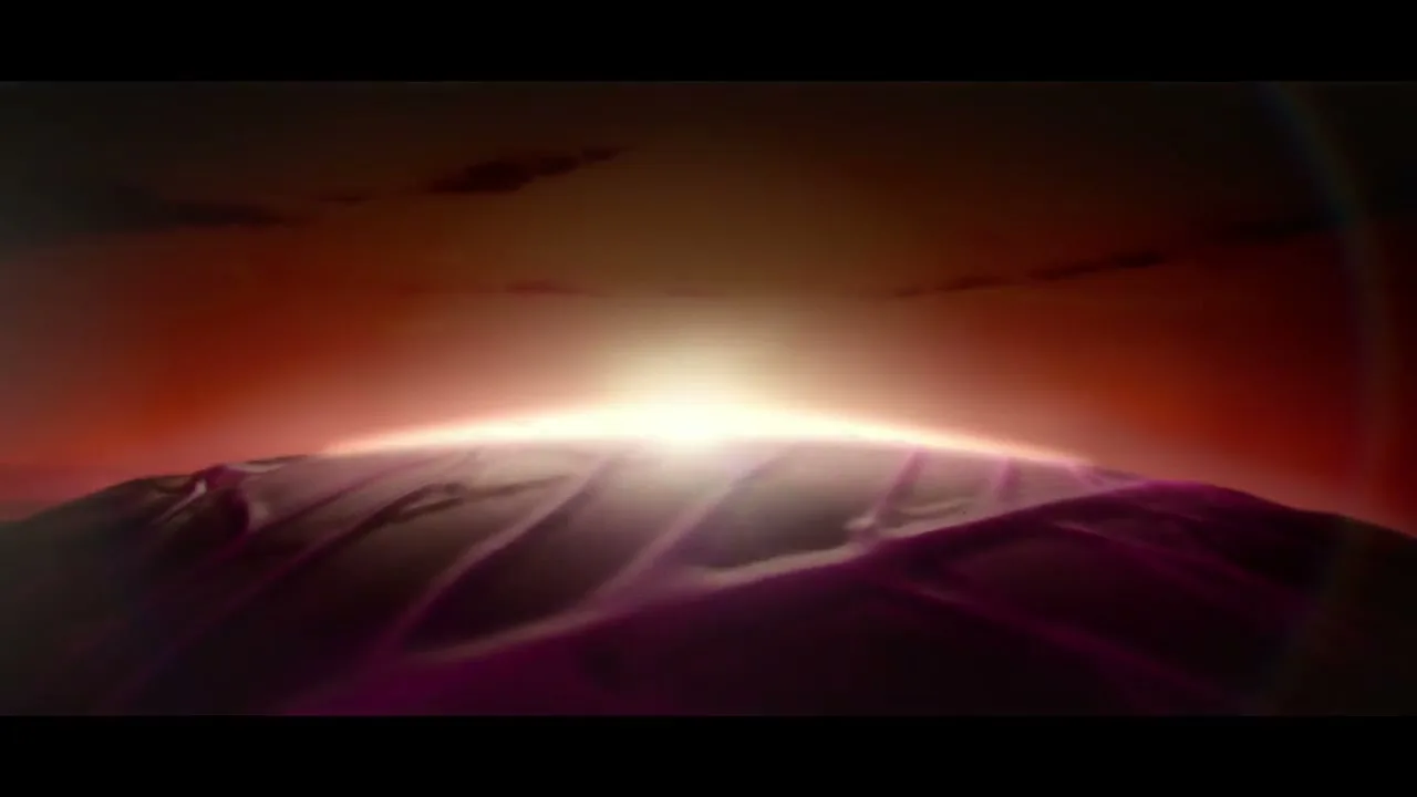 A bright light shines over a dark, textured surface, resembling a stylized sunrise or a glowing horizon.