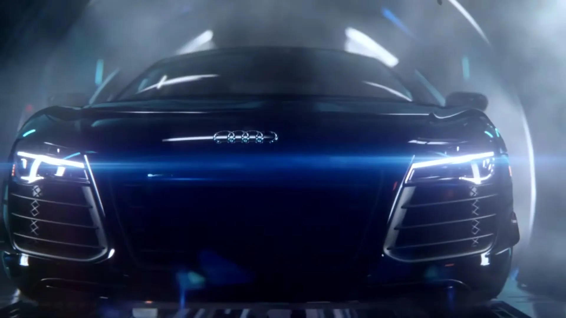 A dark Audi R8 sports car with bright blue headlights glows in a futuristic, smoky tunnel, emphasizing its sleek design.