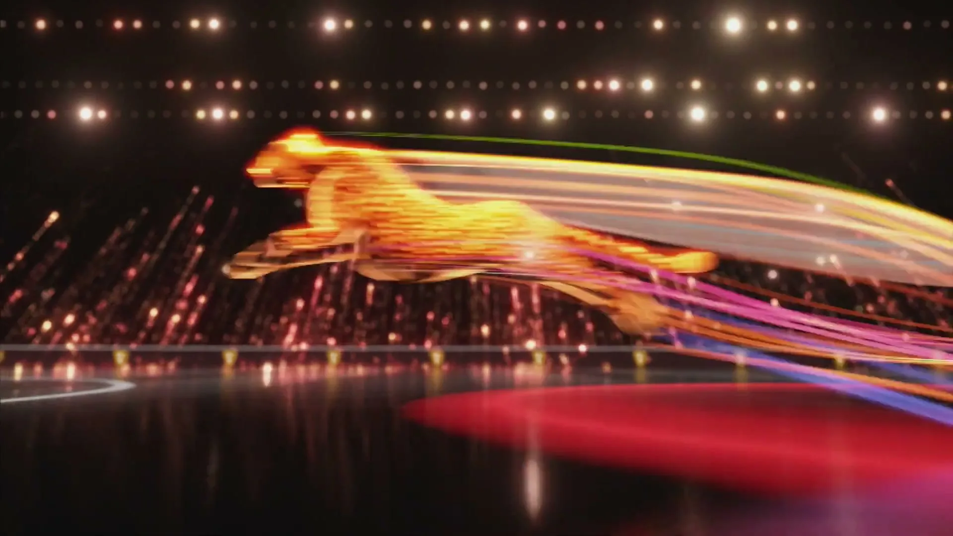 A stylized, glowing cheetah runs across a dark stage, leaving colorful light trails behind it.
