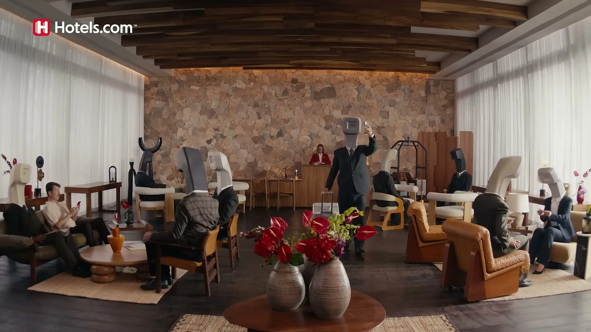 Hotels.com "Save Your Way on Hotels.com - Headphones" (2026) commercial still