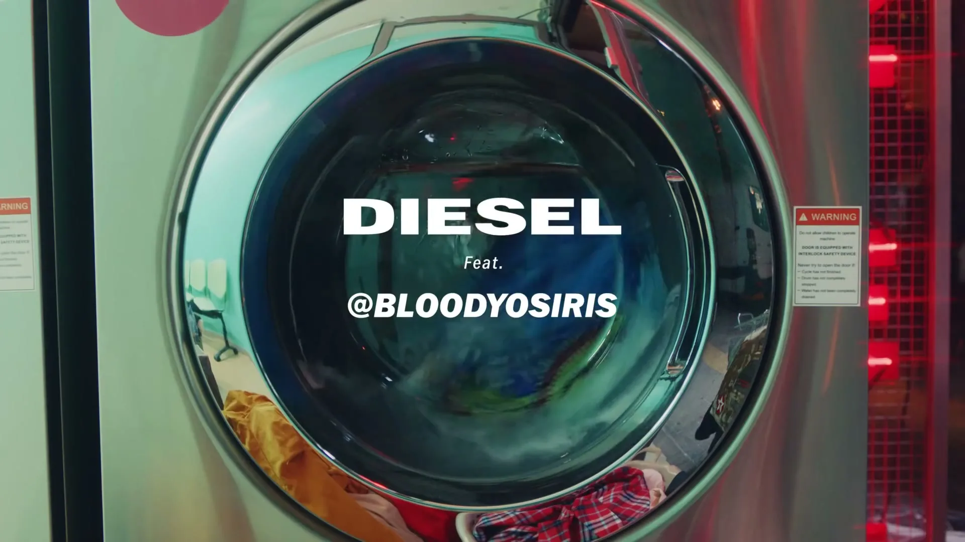 A washing machine with clothes spinning inside is shown in a laundromat, with the Diesel logo and a featured artist's name superimposed on the screen.