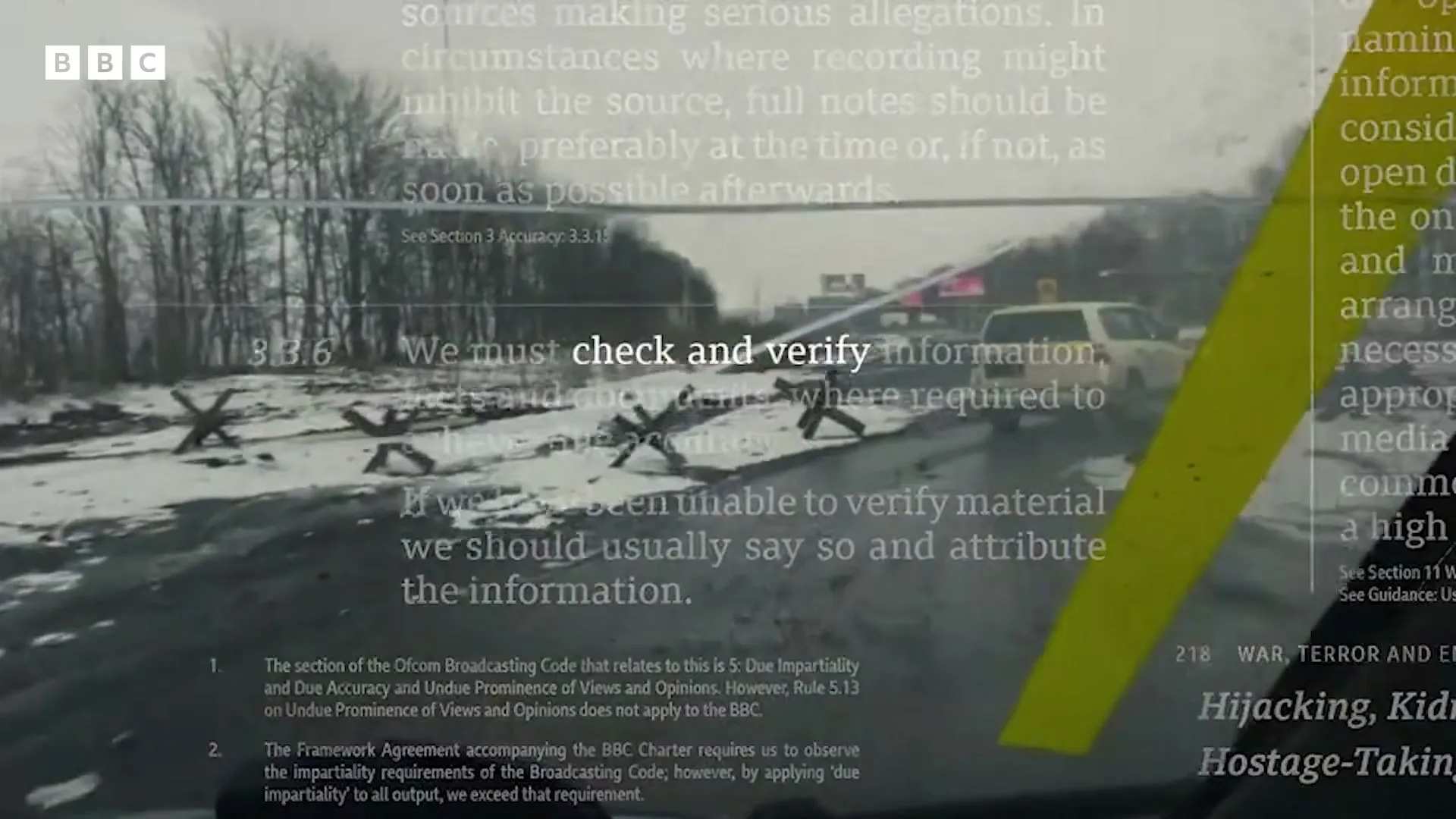 A car drives on a snowy road with anti-tank obstacles, overlaid with text about checking and verifying information.