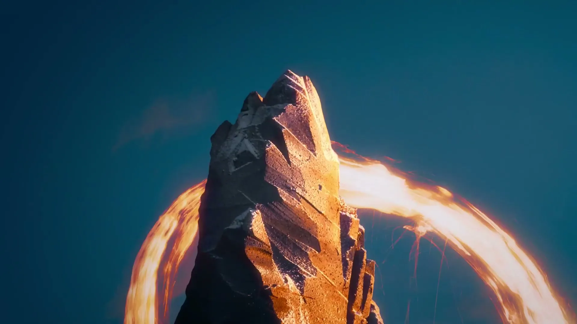 A jagged, dark mountain peak stands against a blue sky, with two arcs of glowing orange energy swirling around it.