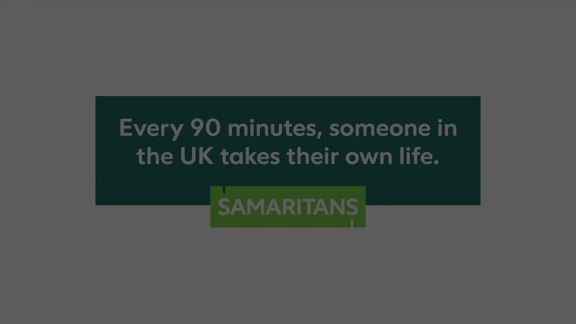 On a grey background, white text appears, stating a statistic about suicide in the UK, followed by the Samaritans logo.