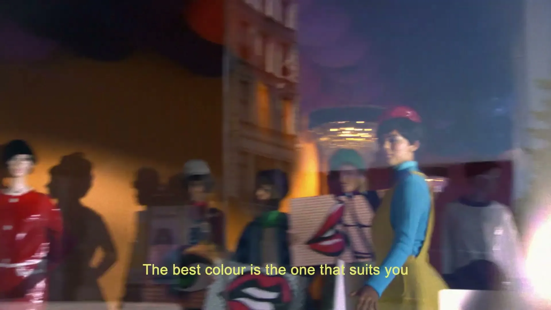 A man and woman in vintage clothing walk past a shop window, which reflects the street and displays mannequins and pop art, with text on screen.