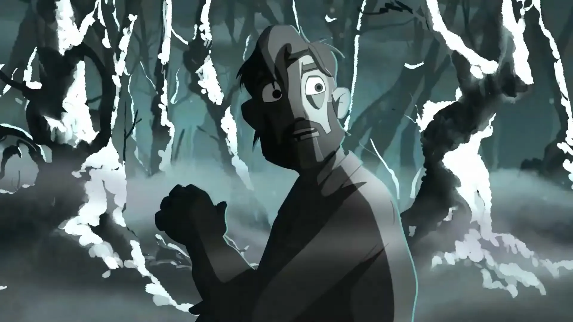 A man with a beard and dark hair, wearing a grey shirt, looks around with a scared expression in a dark, misty forest.