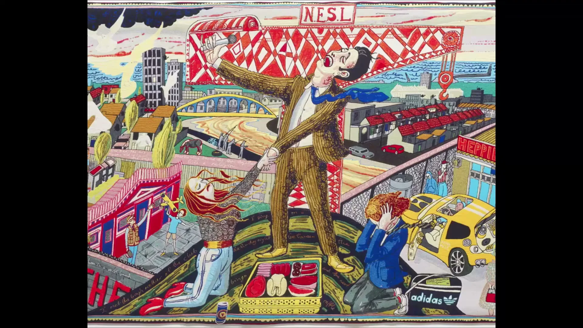 A colorful, stylized tapestry depicts a man in a suit shouting, holding a woman's arm, while a child cries nearby, all set in a busy urban landscape.