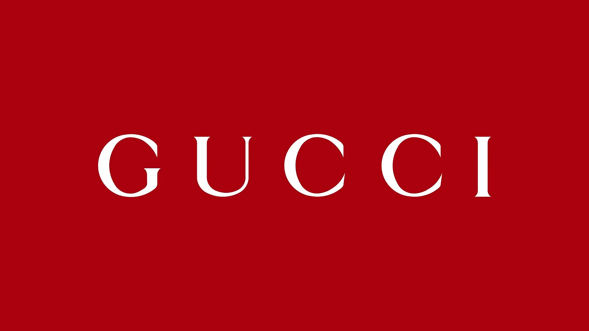 The white wordmark "GUCCI" is centered on a solid red background, serving as a brand identifier.
