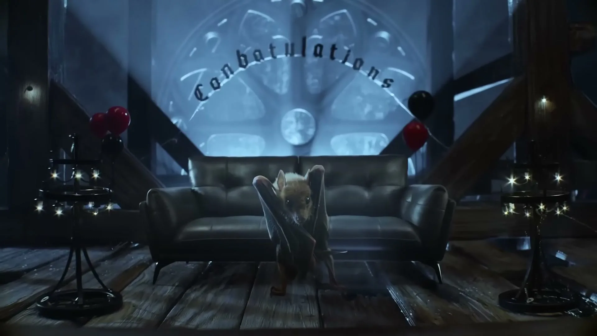 A small bat-like creature with large ears sits on a dark wooden floor in front of a black leather sofa, with "Conbatulations" text on the wall.
