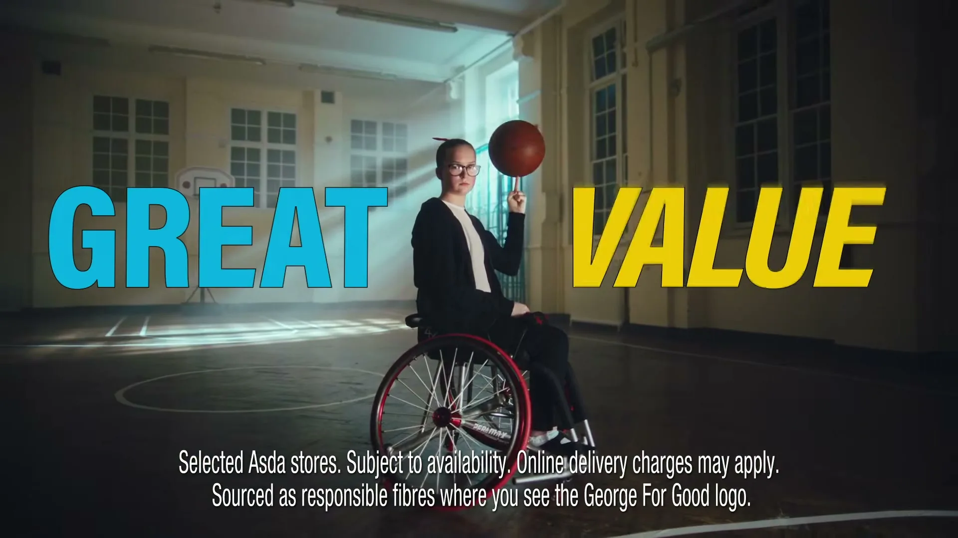A female teen in a wheelchair spins a basketball on her finger in a school gym, with "GREAT VALUE" text on screen.