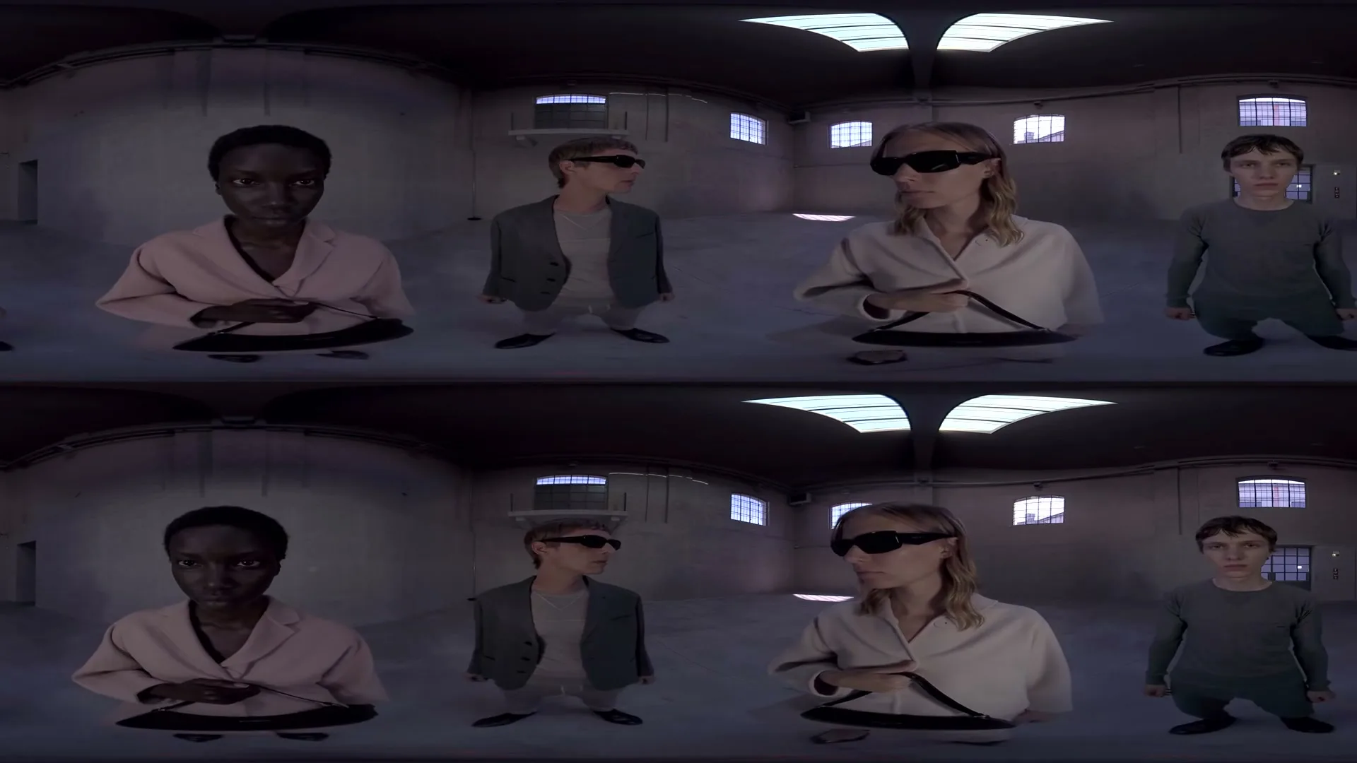 Four models, two male and two female, are seen from multiple angles in a large, empty industrial space, wearing various outfits and sunglasses.