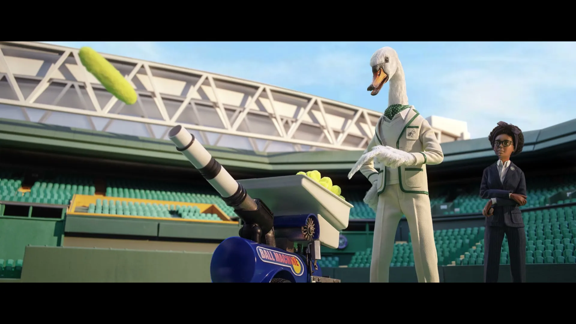 A swan-headed man in a white tennis outfit stands next to a tennis ball machine, while a woman in a suit stands nearby on a tennis court.
