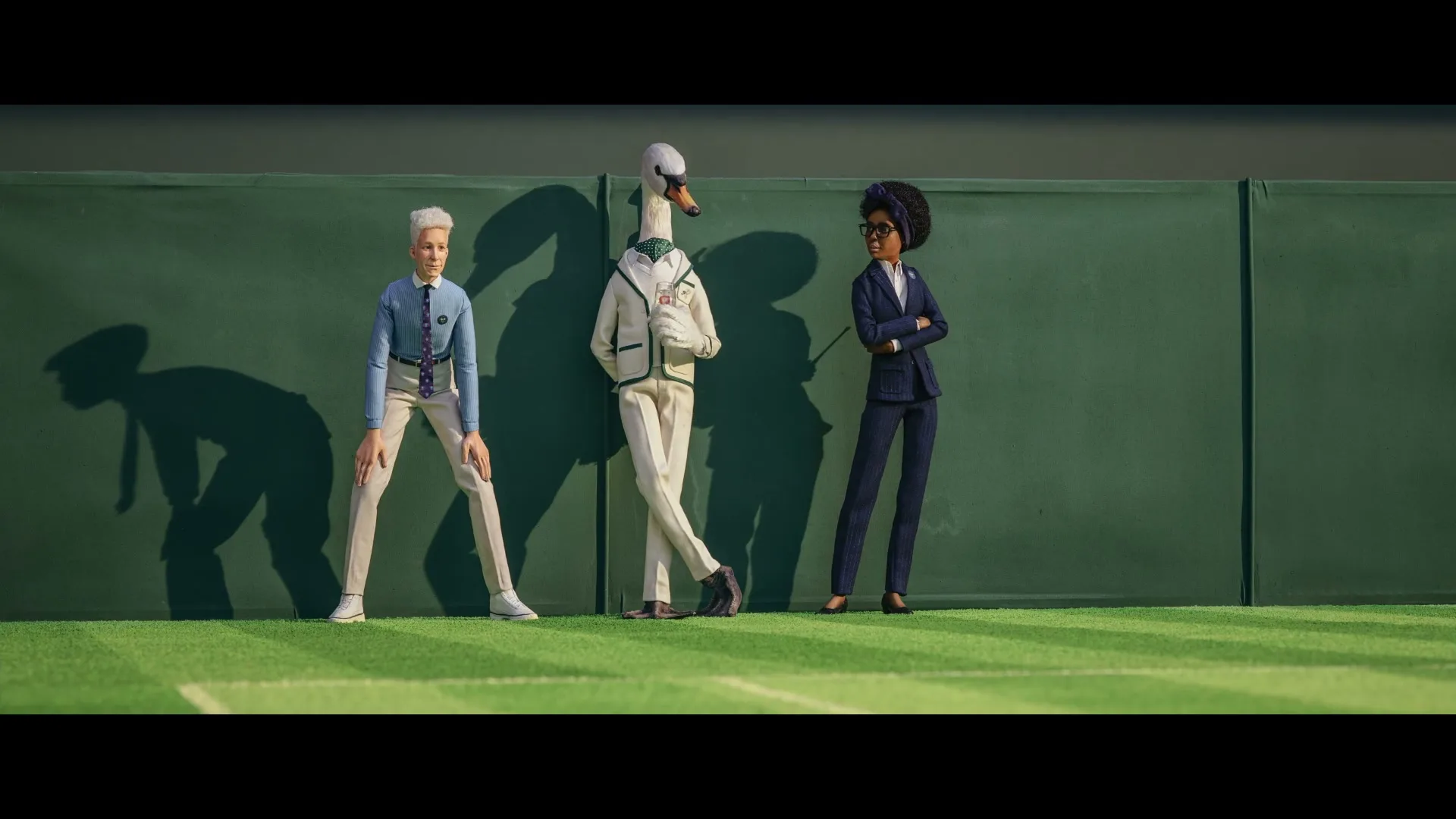 Three animated characters, a man, a swan, and a woman, stand on a tennis court in front of a green wall, looking at the camera.