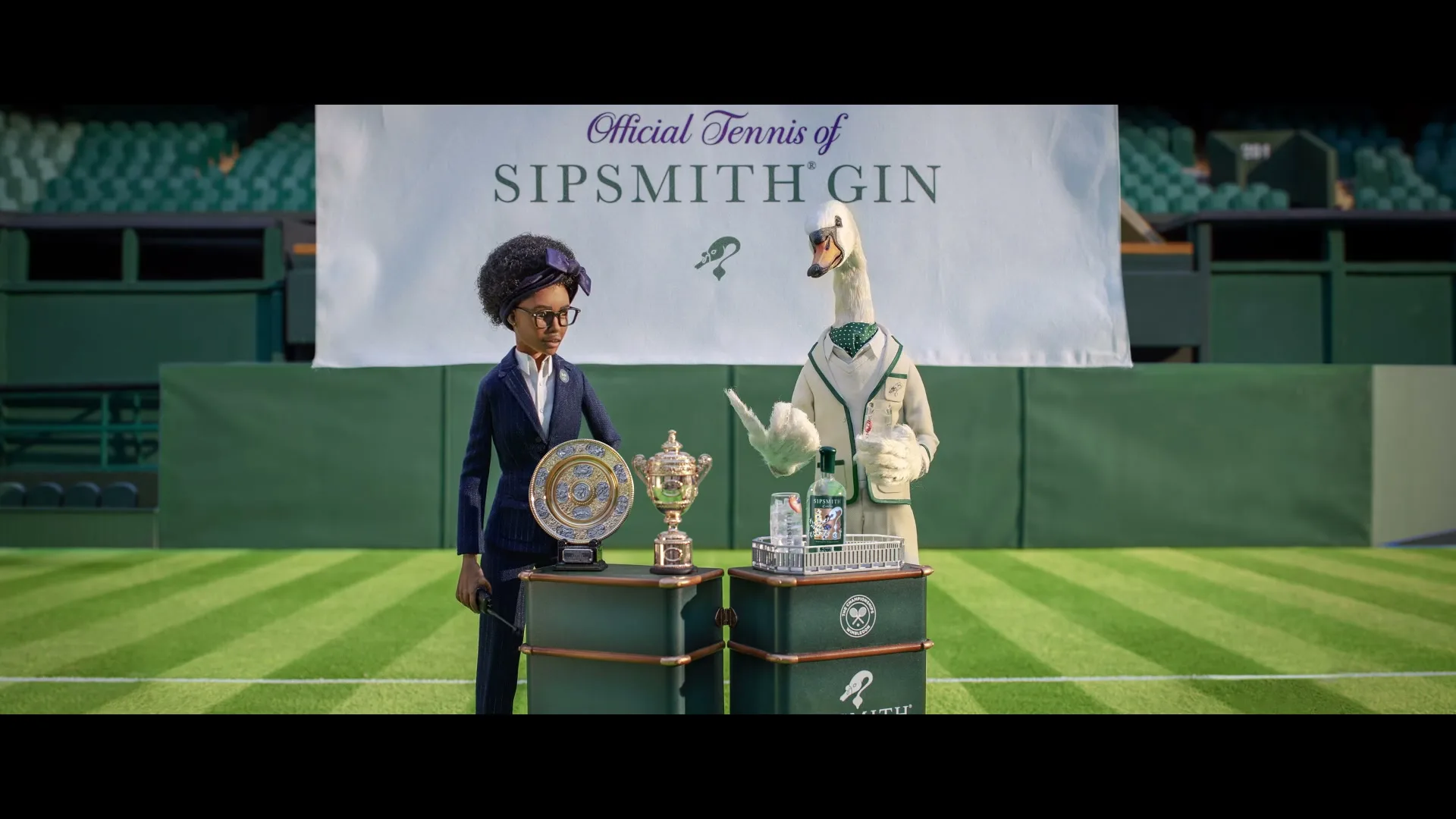 A stop-motion animated woman and a swan in tennis attire stand on a tennis court with trophies and gin bottles, under a banner that reads "Official Tennis of Sipsmith Gin."