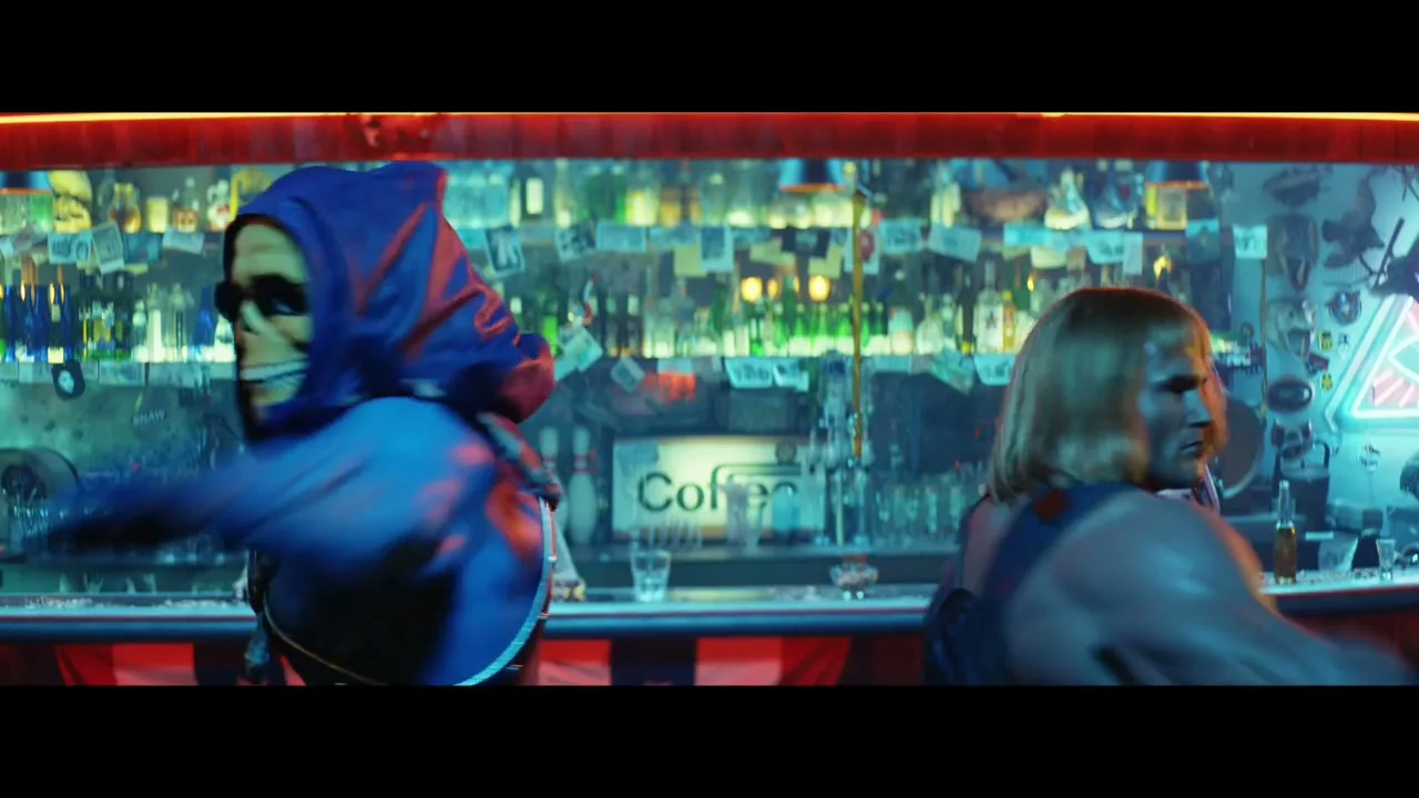 Skeletor and He-Man, dressed in their iconic costumes, do a fist bump and then dance in a neon-lit bar.