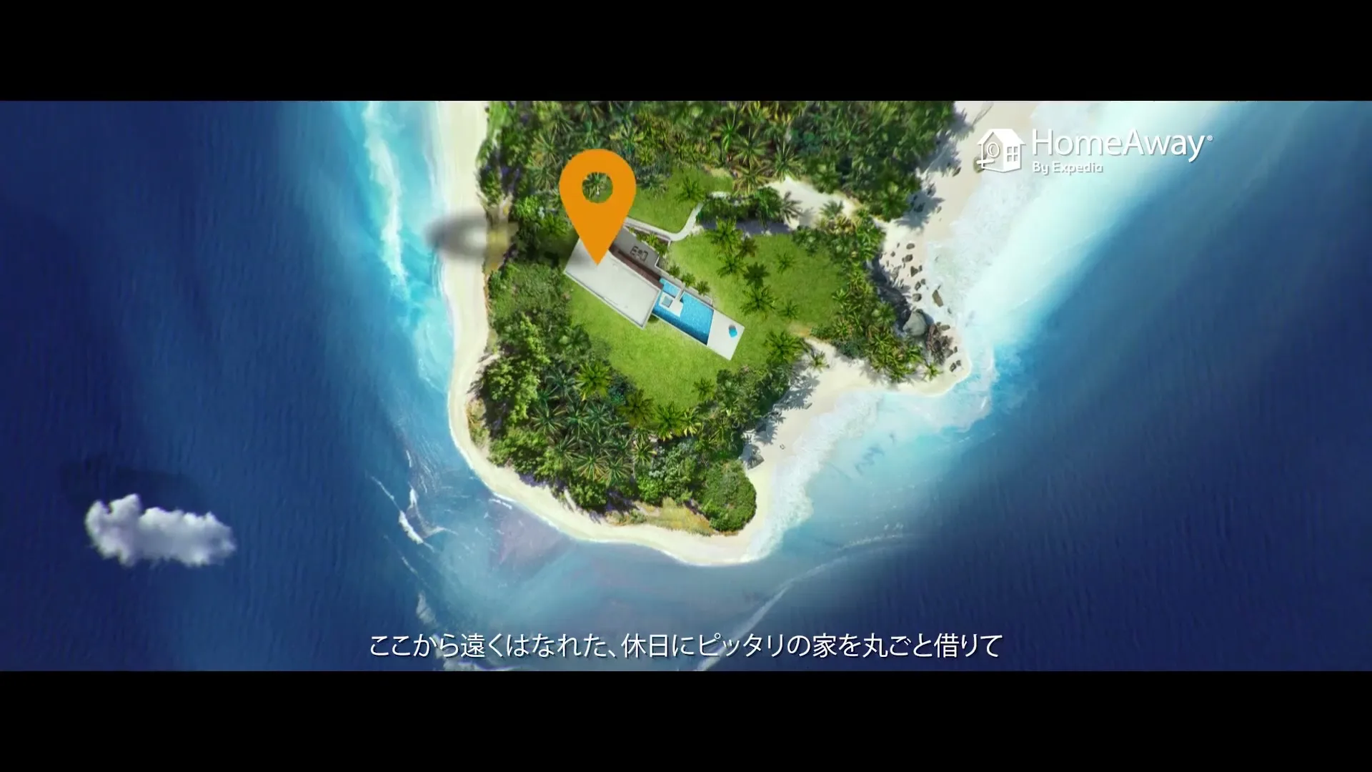 An aerial view of a luxurious house with a swimming pool on a tropical island, surrounded by turquoise water, with a location pin appearing over the house.