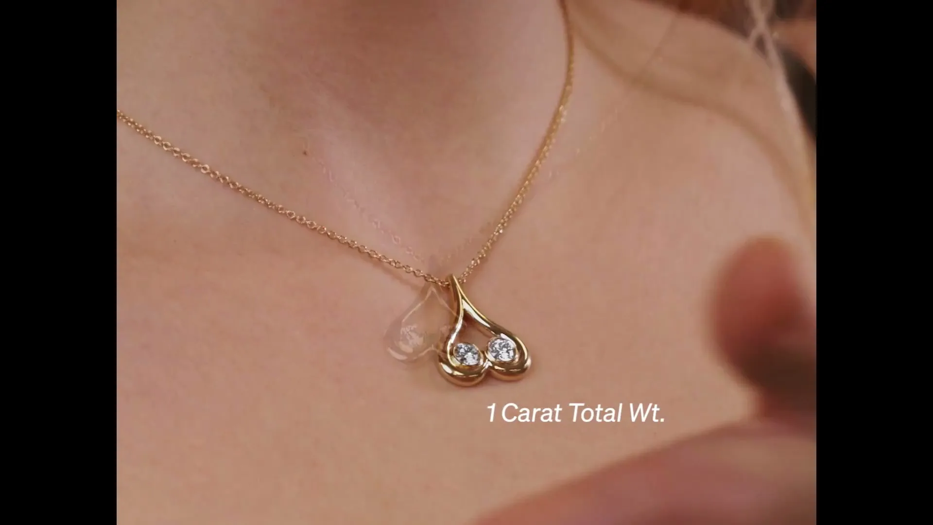 SAXX “Upside Down Heart Pendant” (2024), frame 4
