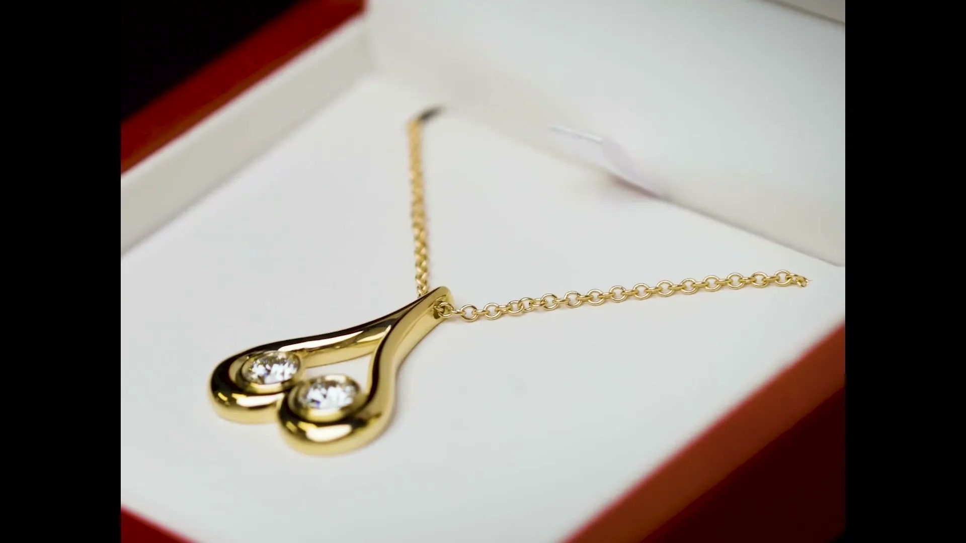SAXX “Upside Down Heart Pendant” (2024), frame 6