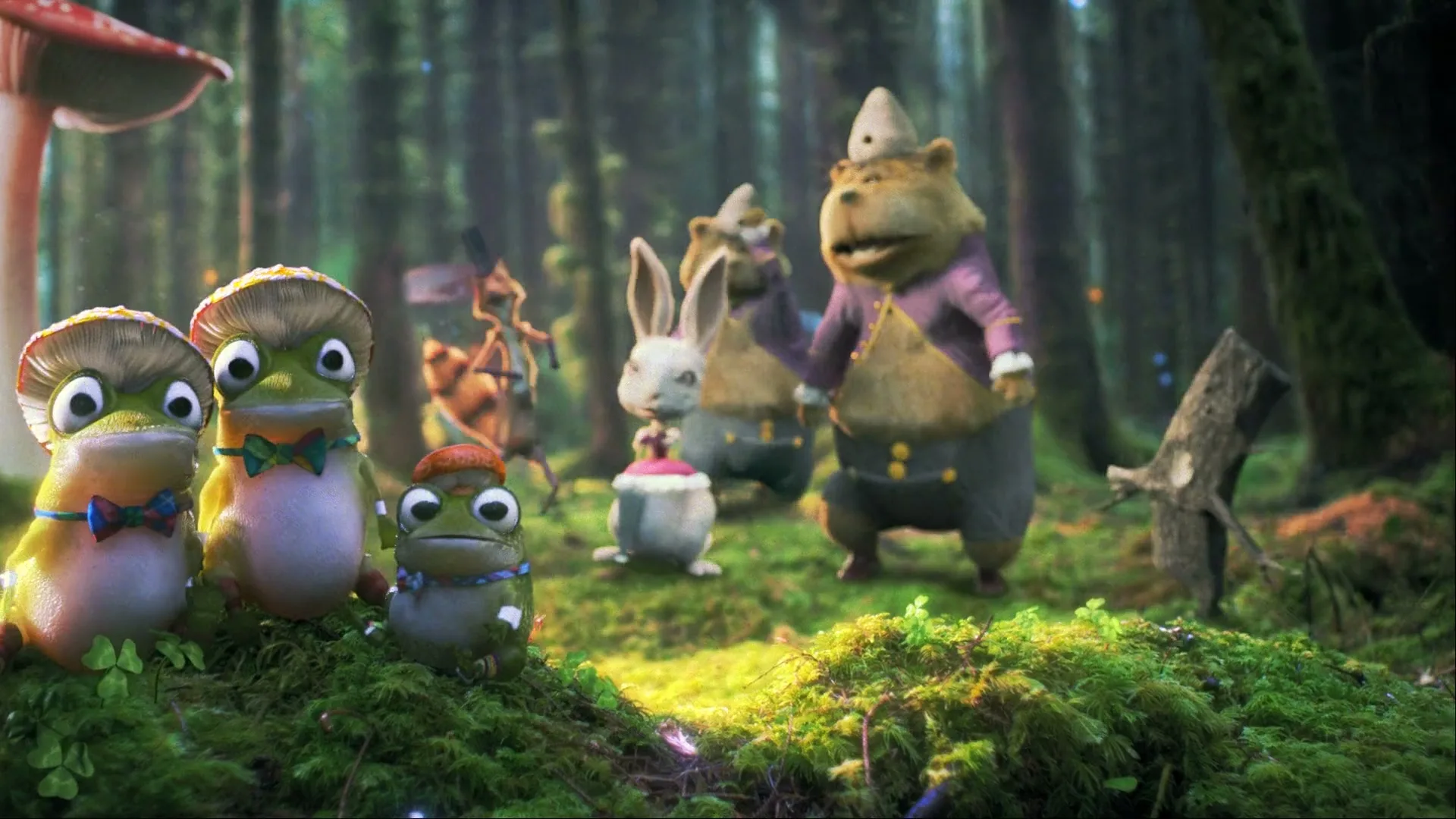 A group of animated forest animals, including frogs, bears, a rabbit, and a squirrel, stand on a mossy forest floor as the camera pulls back.