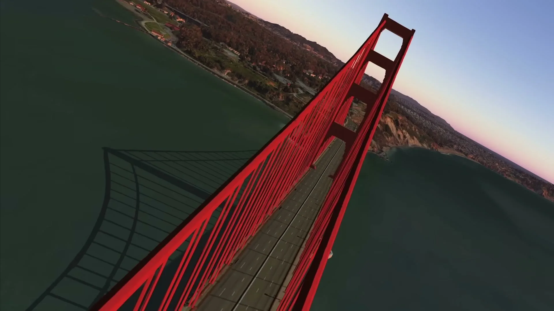 A virtual reality view of the Golden Gate Bridge at sunset, with the camera flying alongside the bridge over the water.