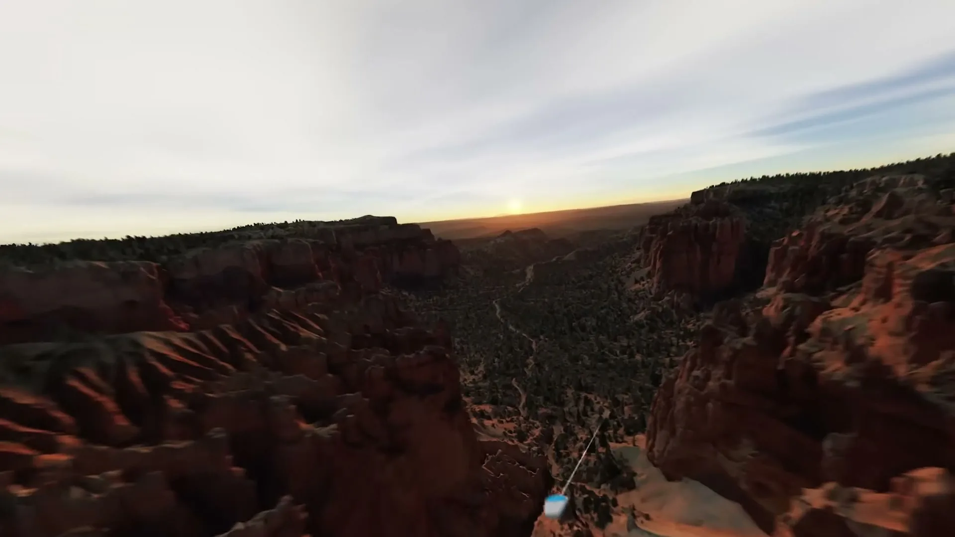 A virtual reality user interface element, a white cylinder with a blue top, floats above a vast, rugged canyon landscape with a sunset in the distance.