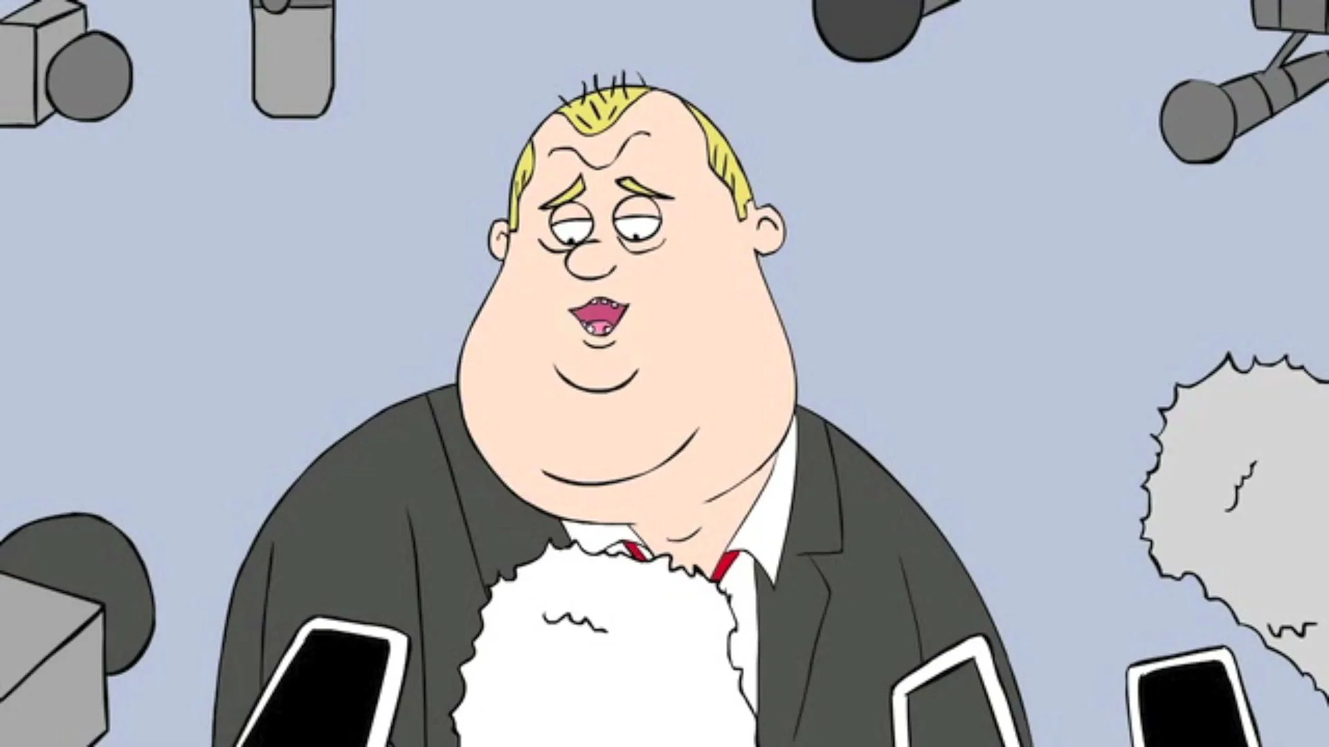 An animated, overweight male character with blonde hair and a suit speaks at a press conference, surrounded by microphones.