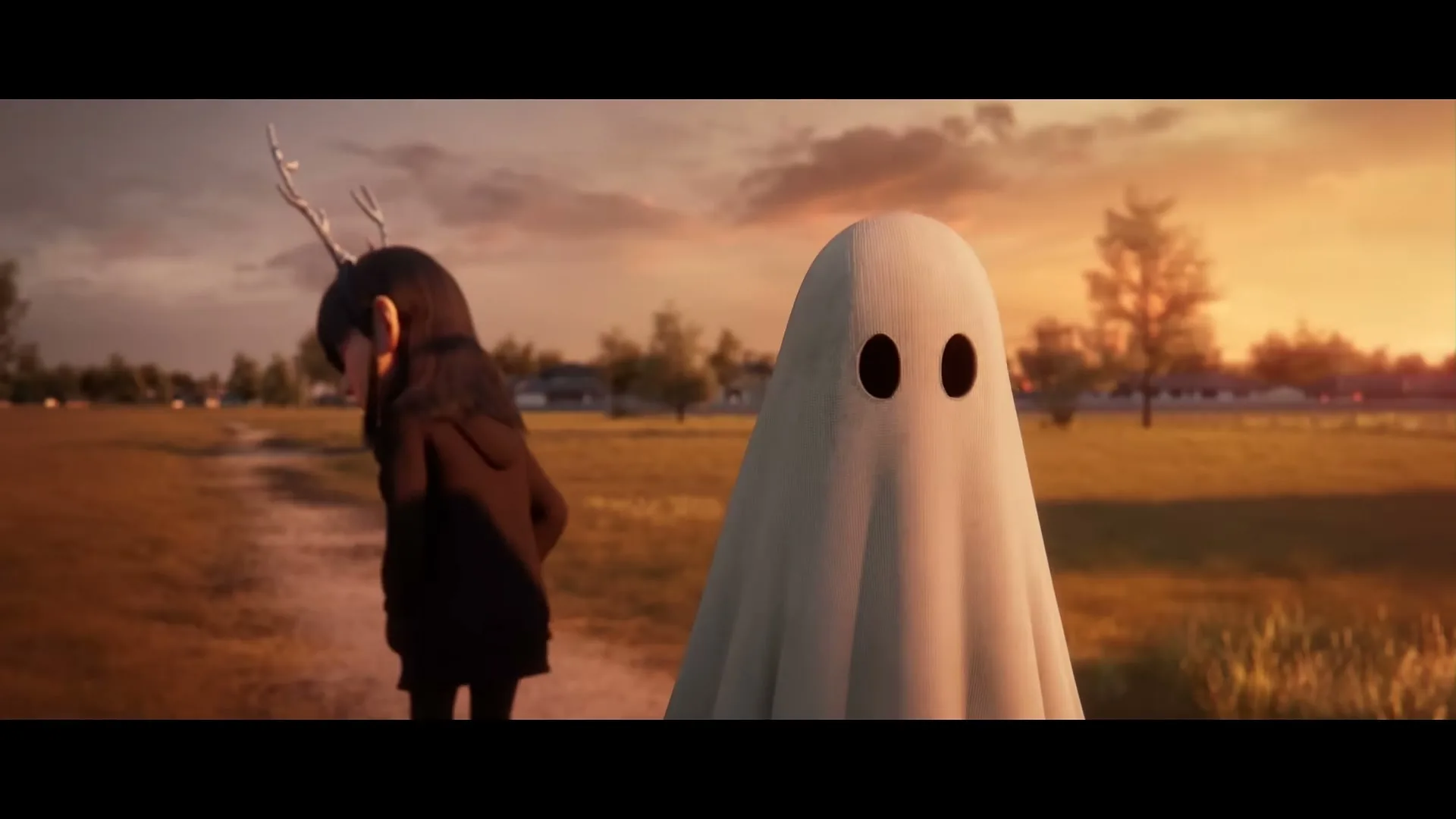 A young girl with antlers on her head walks away from a ghost in a field at sunset, looking sad.