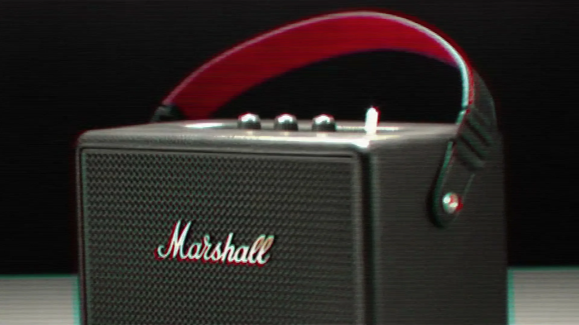 A black Marshall speaker with a red strap is shown with a glitch effect on a black background.