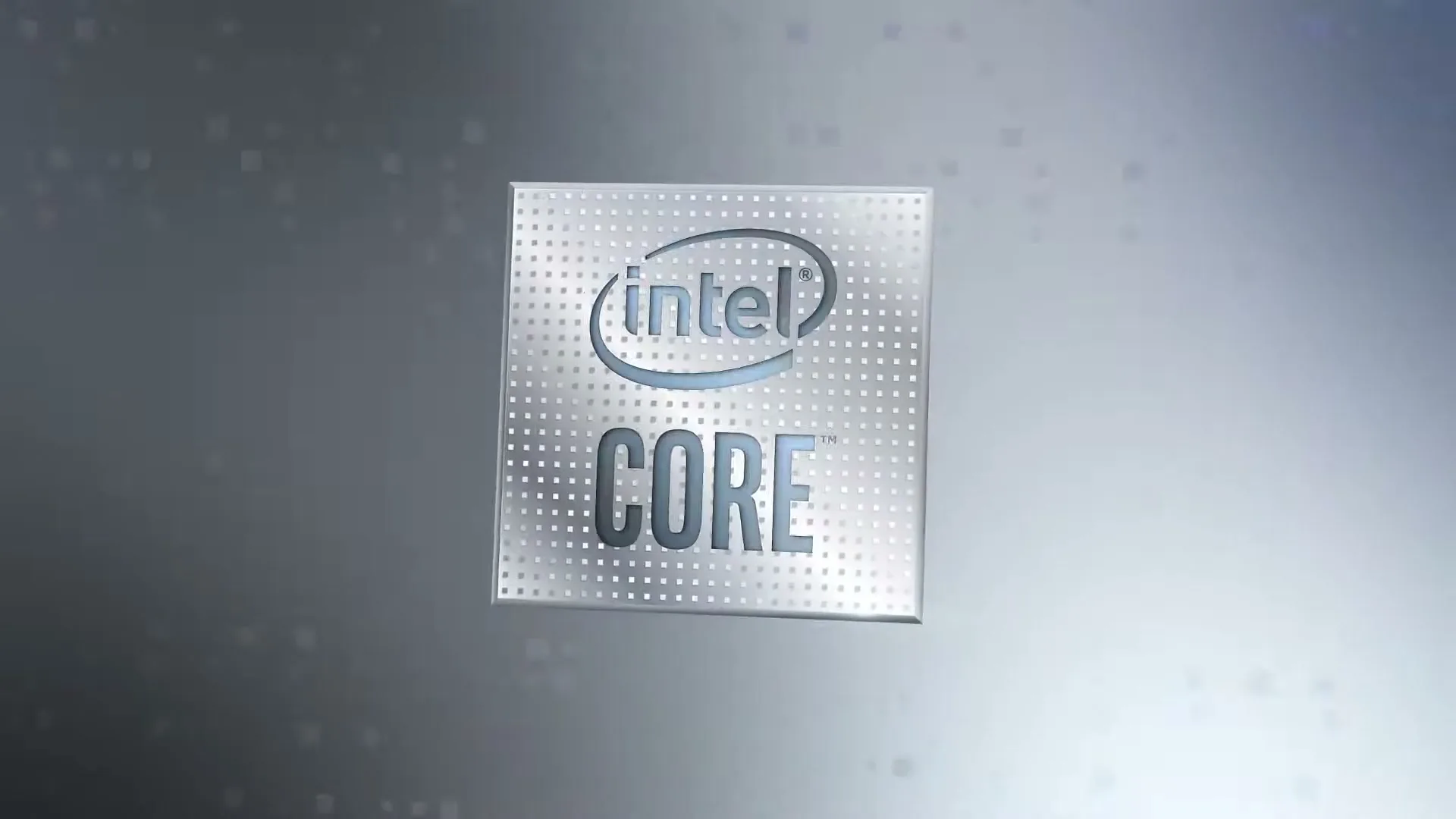 The Intel Core logo, a silver square with the Intel and Core wordmarks, appears and floats in the center of the screen against a grey background.