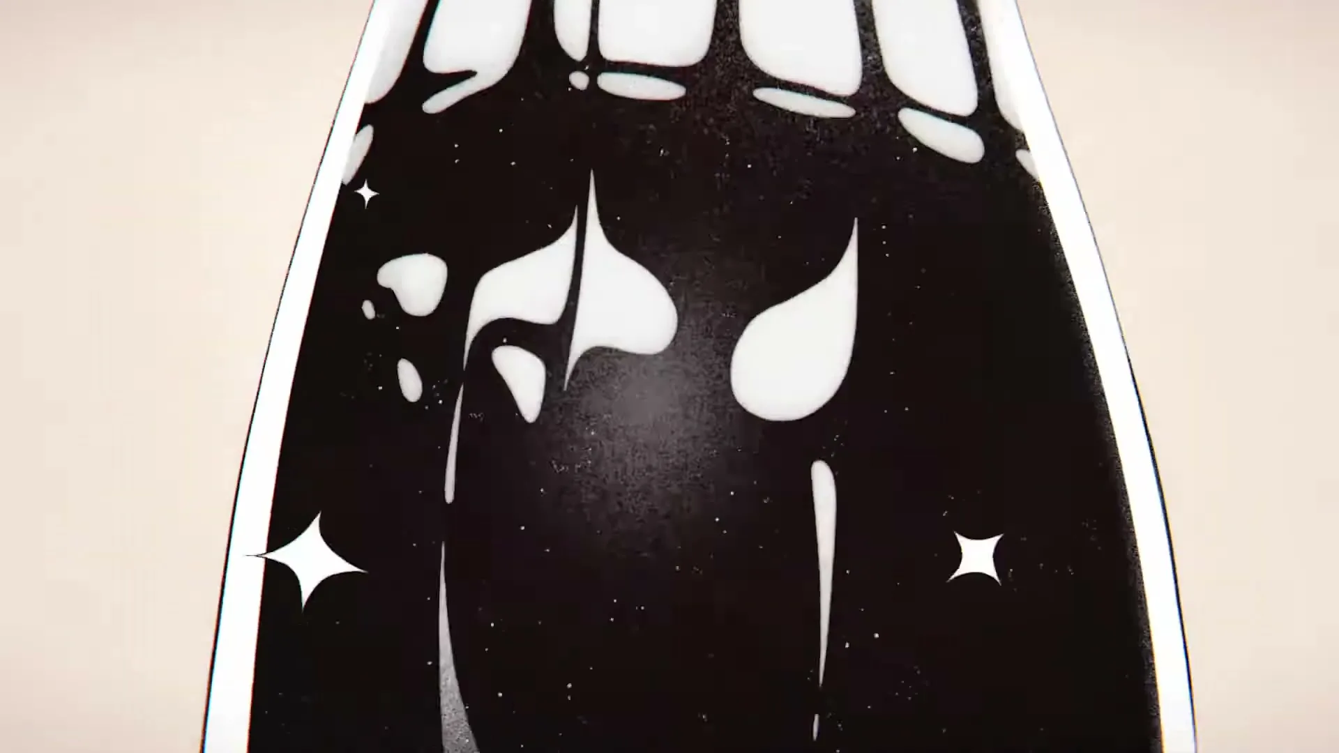 A black screen with white dots transforms into a stylized Coca-Cola bottle, then a cartoon hand catches it.