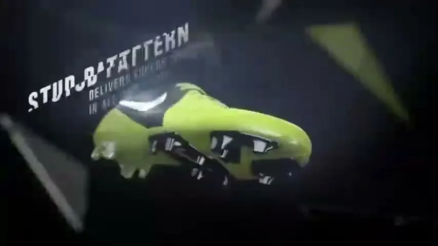 A bright green soccer cleat with a black Nike swoosh is shown in a dark, abstract setting, with text describing its "stud pattern."