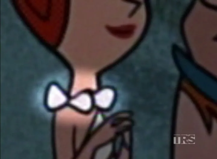 Wilma Flintstone, a cartoon woman with red hair and a white dress, looks at a man in a blue uniform, as a live-action man looks through glasses.