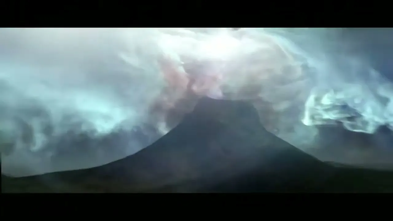 A wide shot of a dark, silhouetted mountain with a bright, glowing light and swirling clouds above it, as the light intensifies and expands.