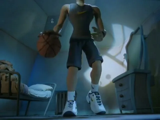 A stop-motion animated male character in a bedroom dribbles a basketball, wearing a grey tank top, dark shorts, white socks, and white sneakers.