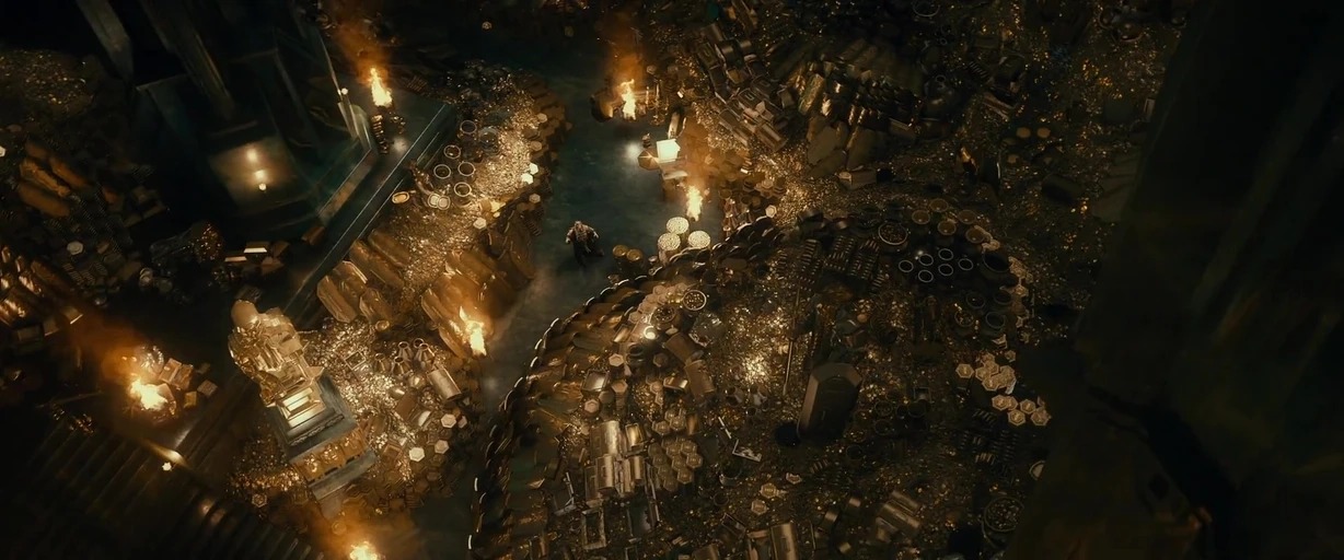 A vast underground cavern is filled with massive piles of gold coins and treasure. Open fires burn in scattered metal braziers, illuminating the metallic surfaces in the dark.
