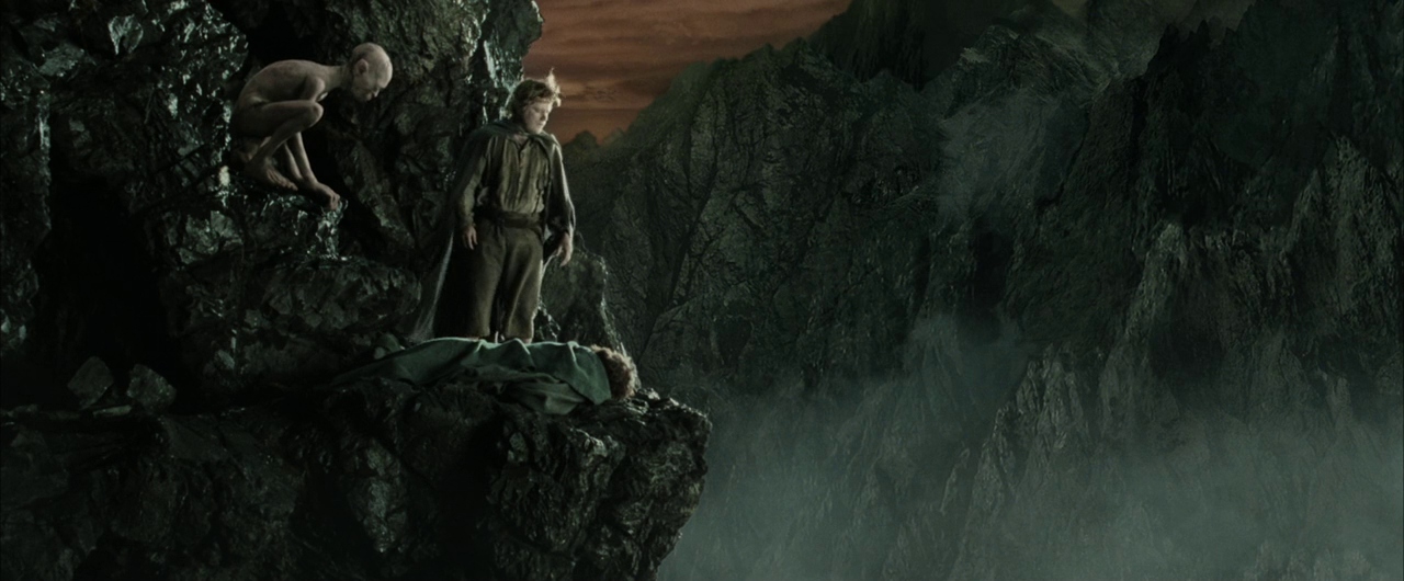 A jagged, misty mountain cliff edge stands against a dark, cloudy sky. One character stands over a sleeping companion while a gaunt figure crouches on rock.