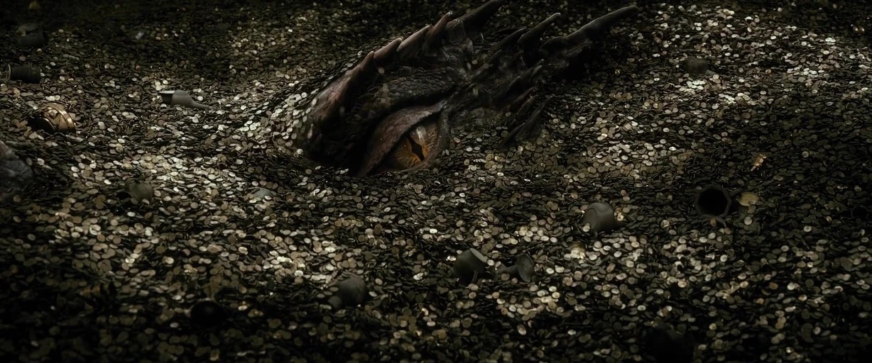 A dark subterranean space is filled with a vast heap of metallic coins. A large dragon eye partially emerges from the surface of the gold hoard.